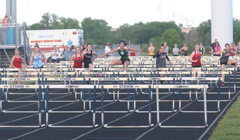 (From left) Henry-Senachwine's Alison Mitchell, Bureau Valley's Addison Wessel, Indian Creek's Ally Keilman, Fulton's Emery Wherry, St. Bede's Lily Bosnich, Amboy's Elly Jones, Indian Creek's Cheyenne Fay and Amboy's Alexa McKendry all compete in the 100 meter hurdles during the Class 1A Sectional meet on Wednesday, May 8, 2024 at Bureau Valley High School.