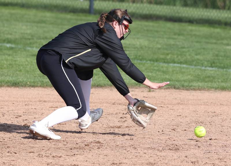 Sycamore's Riley Schuller makes a running play to record an out during their game against Sterling Tuesday, May 14, 2024, at Sycamore High School.