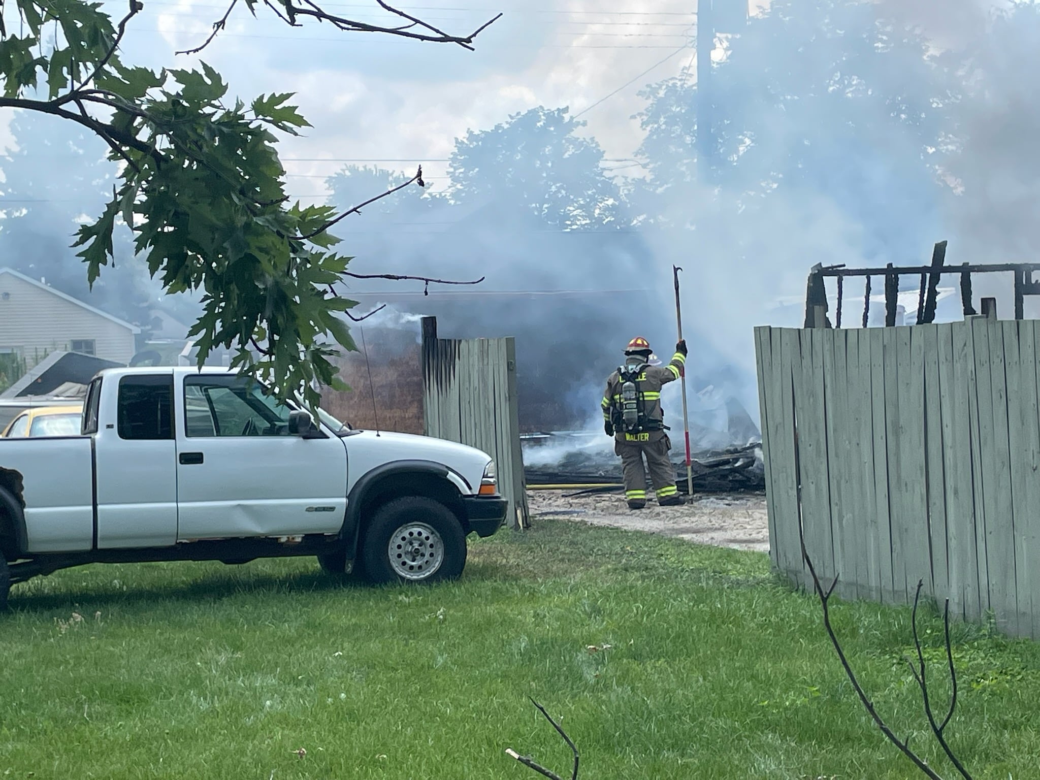 A rear view of the fire being battled in a residential area between Eighth and Ninth streets and Lafayette and Bucklin streets in La Salle.