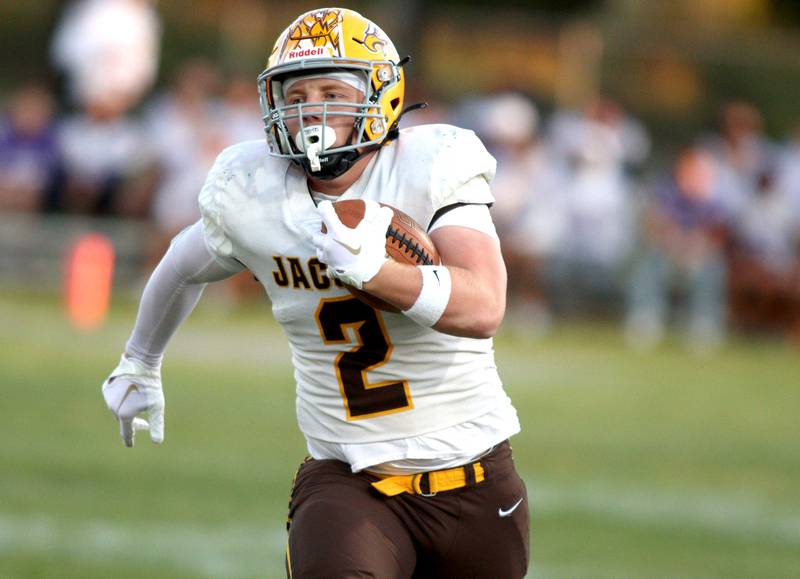 Jacobs’ Caden DuMelle make a long touchdown run in varsity football on Friday, Sept. 6, 2024, at Hampshire School in Hampshire.