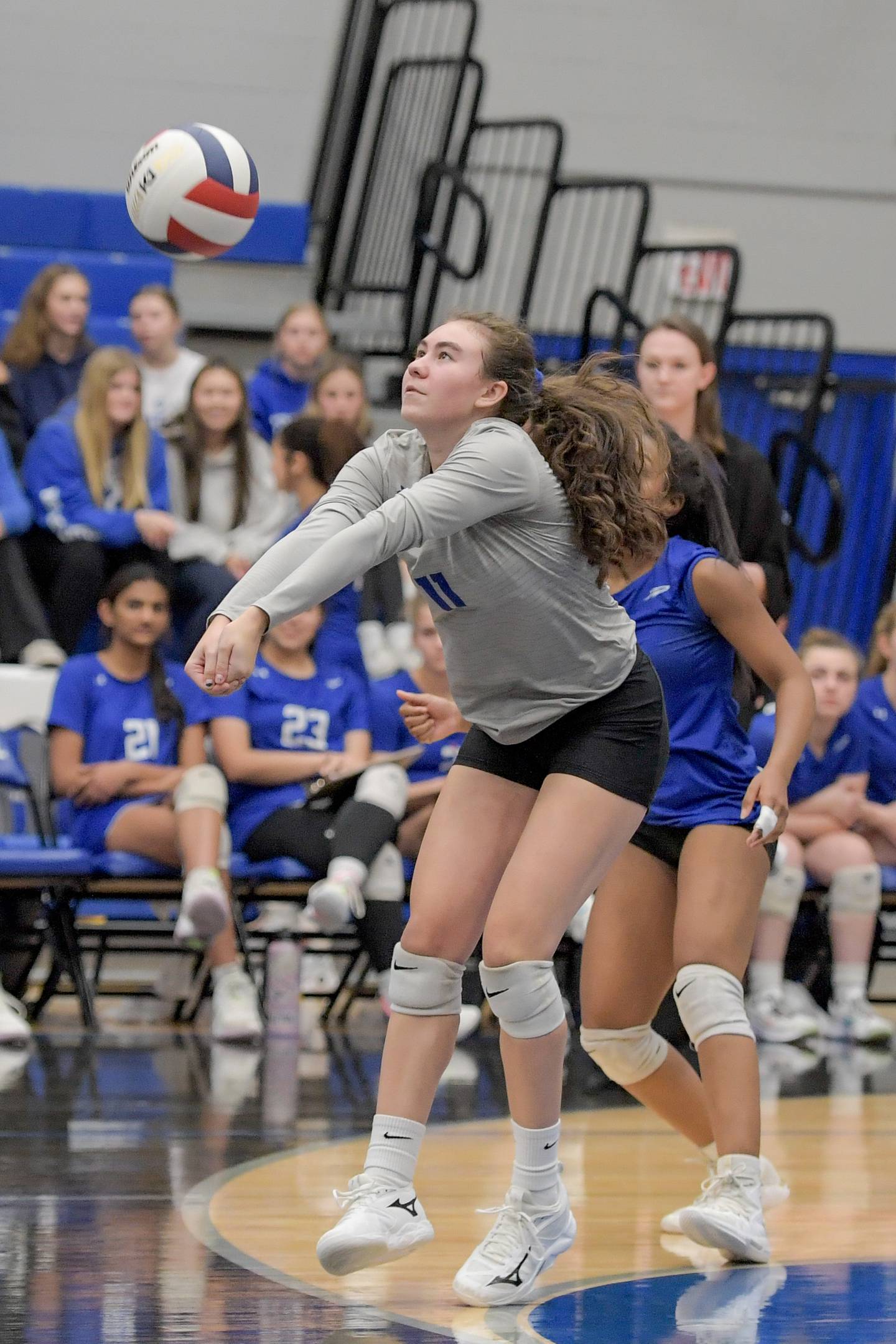 Central's Brianna Gritzman (11) returns the serve from Sycamore during the Class 3A Burlington Central Girls Volleyball Regional on Thursday, Oct. 26, 2023.