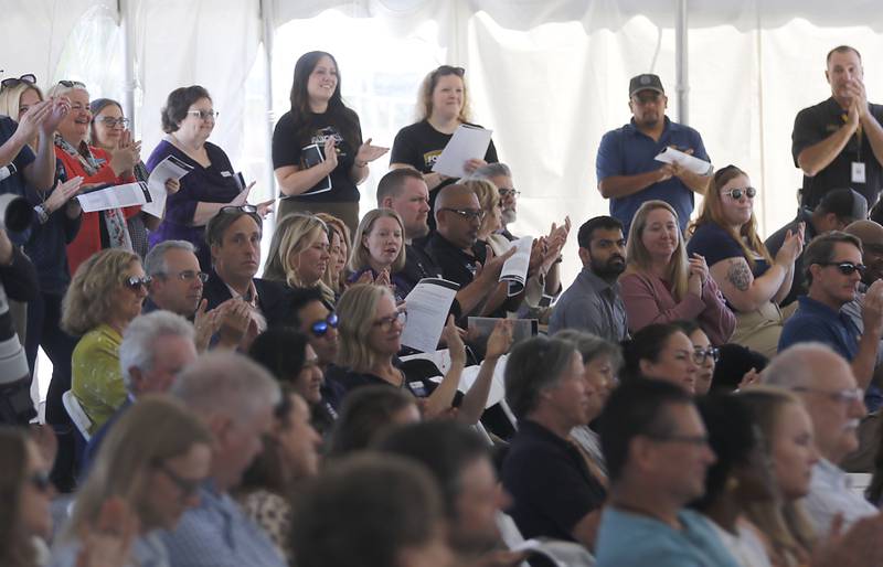 People clap for Vince Foglia as he speaks during the opening ceremony for the Foglia Center for Advanced Technology and Innovation on Tuesday, Sept. 3, 2024, at McHenry County College.