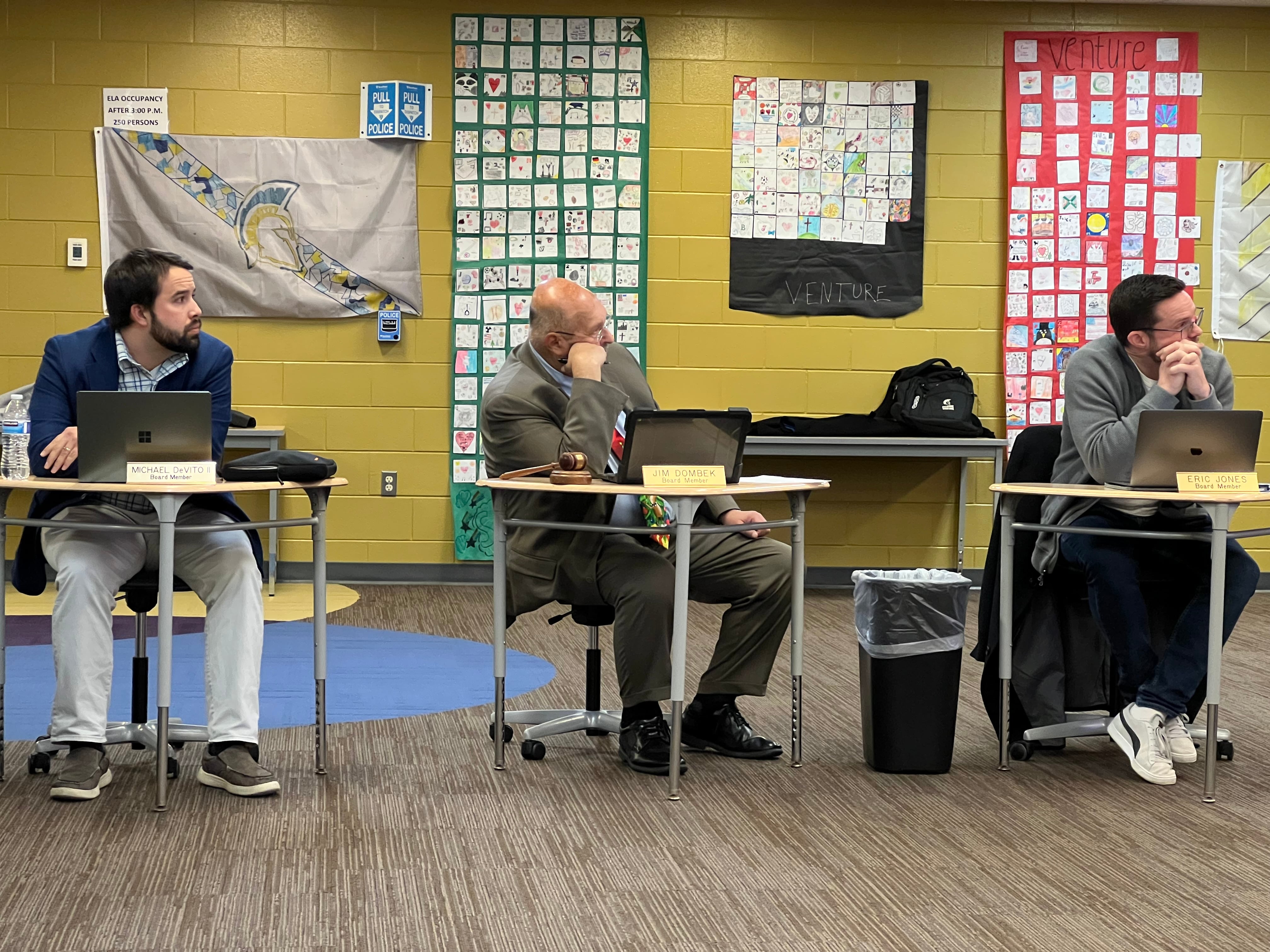 Sycamore Community School District 427 board of education Vice President Michael DeVito, President Jim Dombek, and board member Eric Jones listen to an administrator speak during a board meeting in this Shaw Local file photo on Dec. 12, 2023, inside Sycamore Middle School.