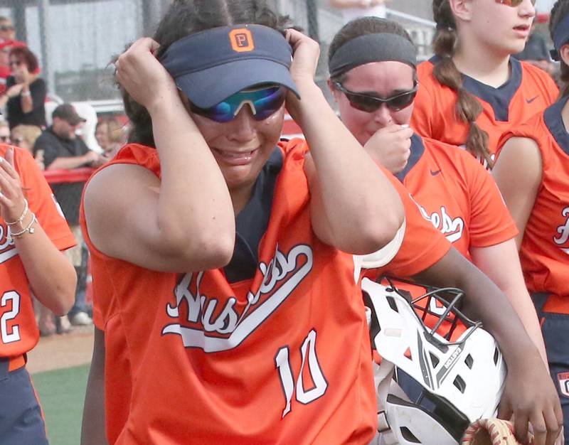 Oak Park-River Forest's Rachel Buchta reacts while walking off the field against Yorkville during the Class 4A State semifinal softball game on Friday, June 9, 2023 at the Louisville Slugger Sports Complex in Peoria.