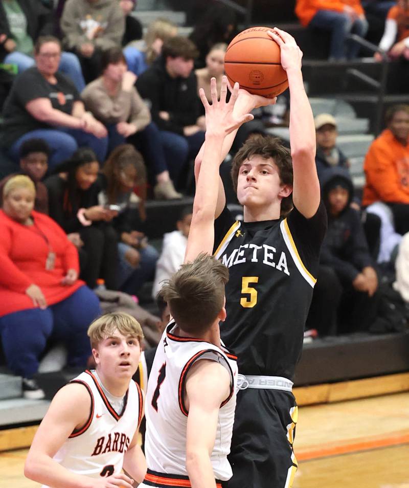 Metea Valley's Jake Nosek shoots over DeKalb’s Jackson Kees during their game Friday, Jan. 19, 2024, at DeKalb High School.