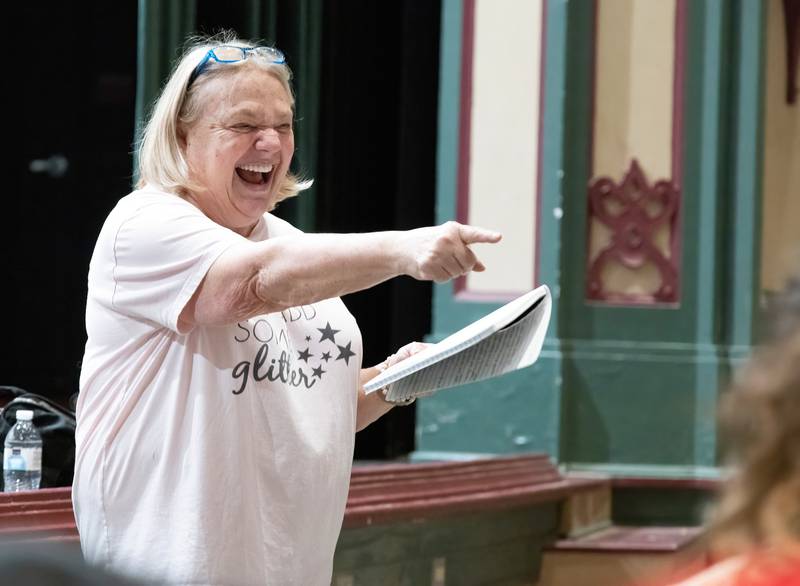 Ottawa High School director Sue Williamson lets out a laugh during rehearsal Tuesday, April 25, 2023. She is retiring after directing 88 performances.