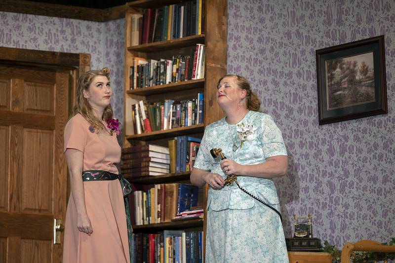 Rhylee Hinkle (left), playing Myrtle Mae Simmons and Michelle Hinkle, playing Vita Louise Simmons rehearse a scene Wednesday, May 1, 2024 for PACT’s “Harvey.”