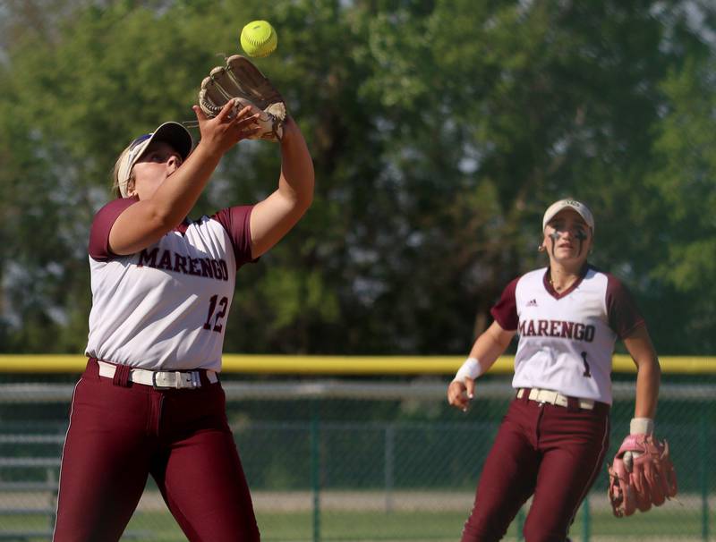 Marengo’s Emily White snags a pop up against North Boone in IHSA Softball Class 2A Regional Championship action at Marengo Friday.