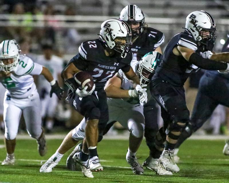 Plainfield North's Malik Jassim (22) runs with the ball during a football game between York at Plainfield North on Friday, Sept 6th, 2024 in Plainfield. Gary E Duncan Sr for Shaw Local News Network.