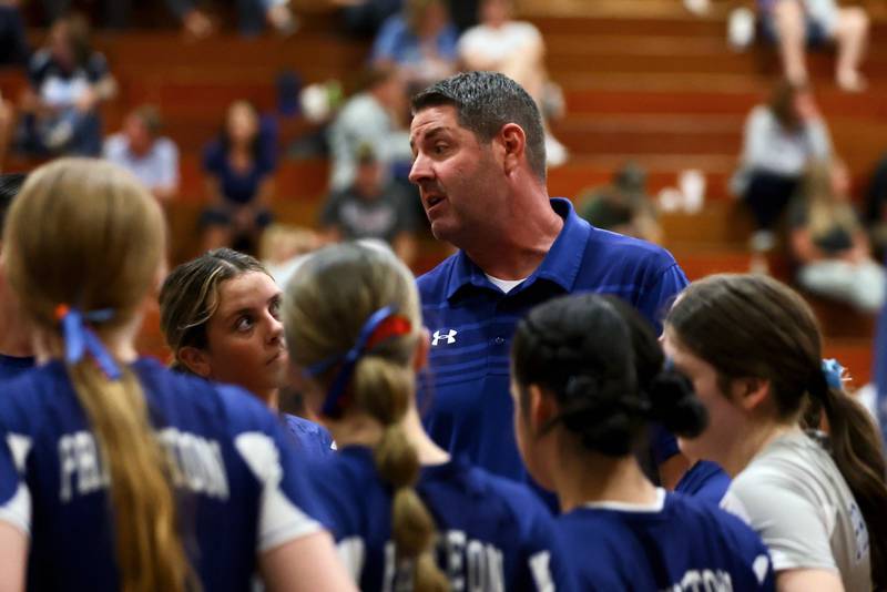 Princeton coach Andy Puck talks to his team during a timeout of Tuesday's match with Mendota at Prouty Gym. The TIgresses won 25-23, 25-19 handing Puck his 500th career victory in his 24th year.