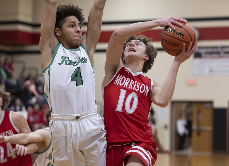 Morrison’s Colton Bielema goes to the hoop against Rock Falls’ Devin Tanton-DeJesus Wednesday, Feb. 21, 2024 at the Prophestown class 2A basketball regional.