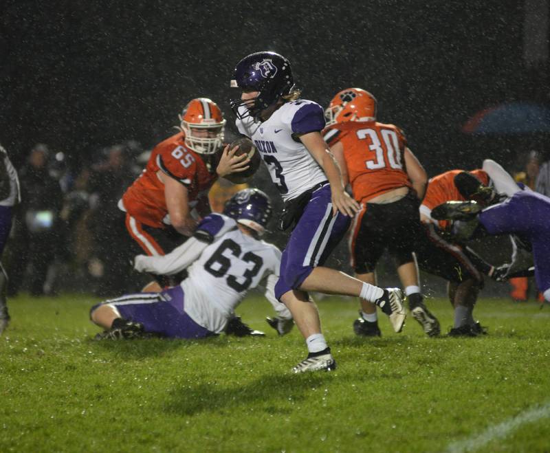 Dixon's Tyler Shaner (3) looks for running room against Byron on Friday, Oct. 13, 2023 at Byron High School's Everett Stine Field.