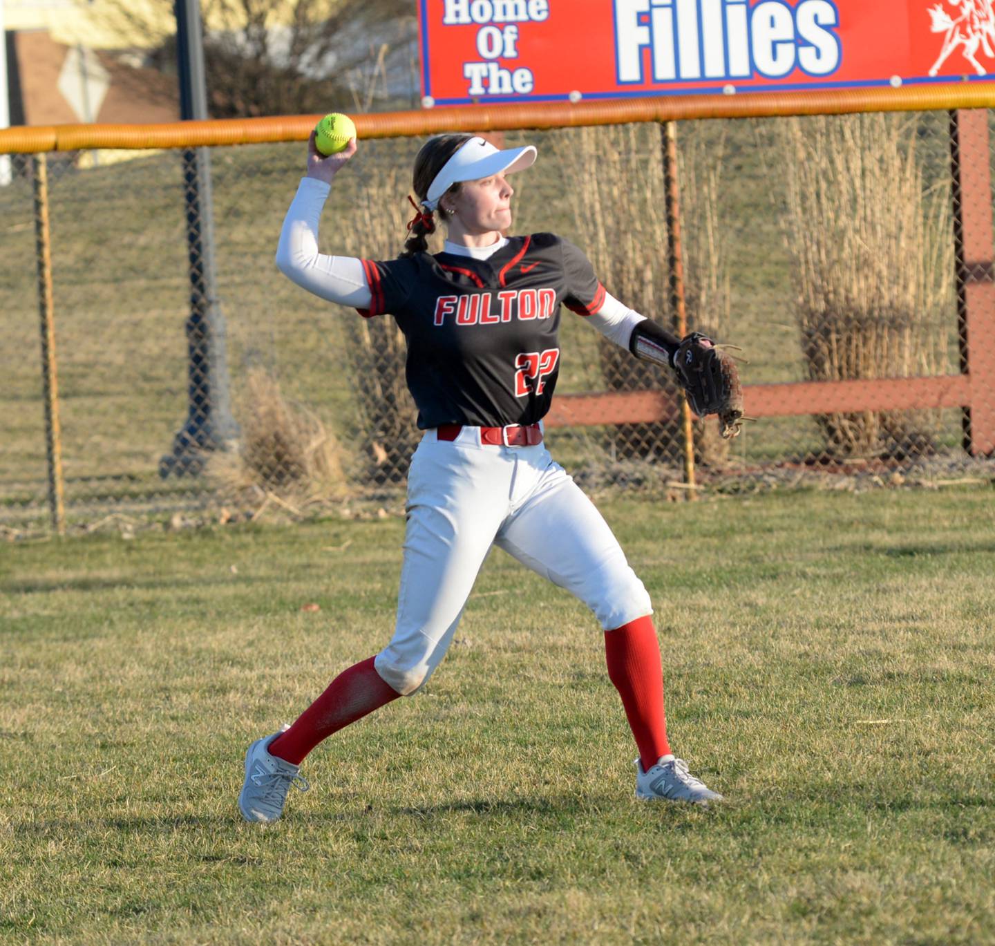 Fulton left fielder Zoe Kunau throws to second base against Morrison on Friday, March 15. 2024 at the Morrison Sports Complex.