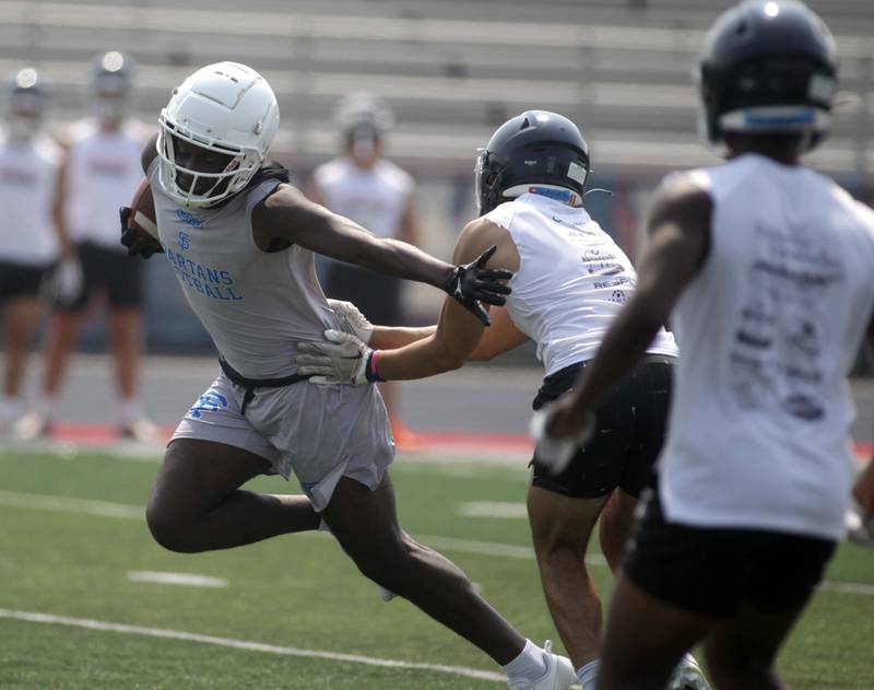 St. Francis’ DeShaun Williams makes a catch during a 7-on-7 football tournament at West Aurora High School on Friday, June 23, 2023.