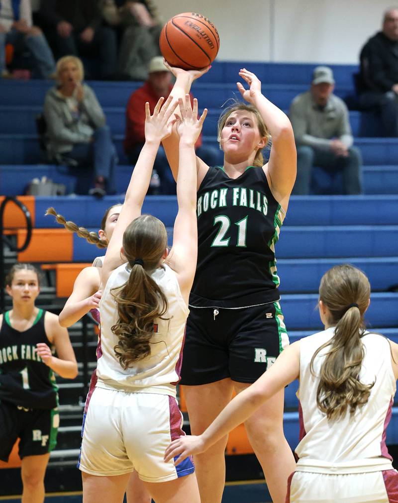 Rock Falls' Nicolette Udell shoots over a Genoa-Kingston defender during their game Friday, Feb. 2, 2024, at Genoa-Kingston High School.