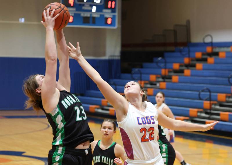 Rock Falls' Claire Bickett and Genoa-Kingston's Regan Creadon go after a rebound during their game Friday, Feb. 2, 2024, at Genoa-Kingston High School.