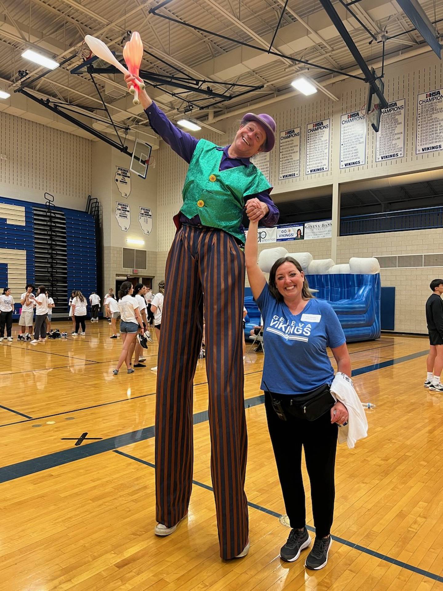 Geneva High School's 2023 post prom party featured a performing troupe that included a juggler on stilts. Post prom chair Holly Kennedy, right, said she needs more volunteers for this year's event.