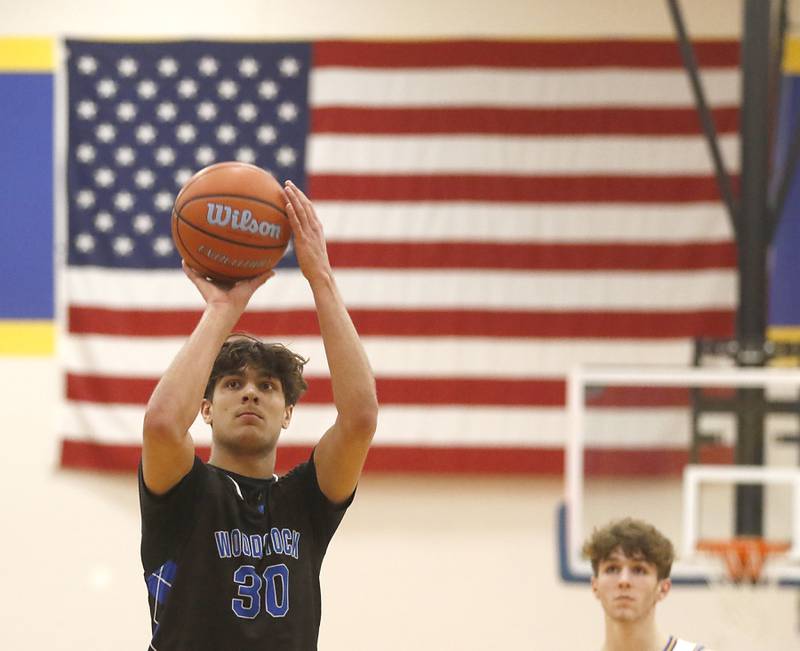 Woodstock's Spencer Cullum shoots a foul shot during a Kishwaukee River Conference boys basketball game Friday, Feb.9, 2024, at Johnsburg High School.