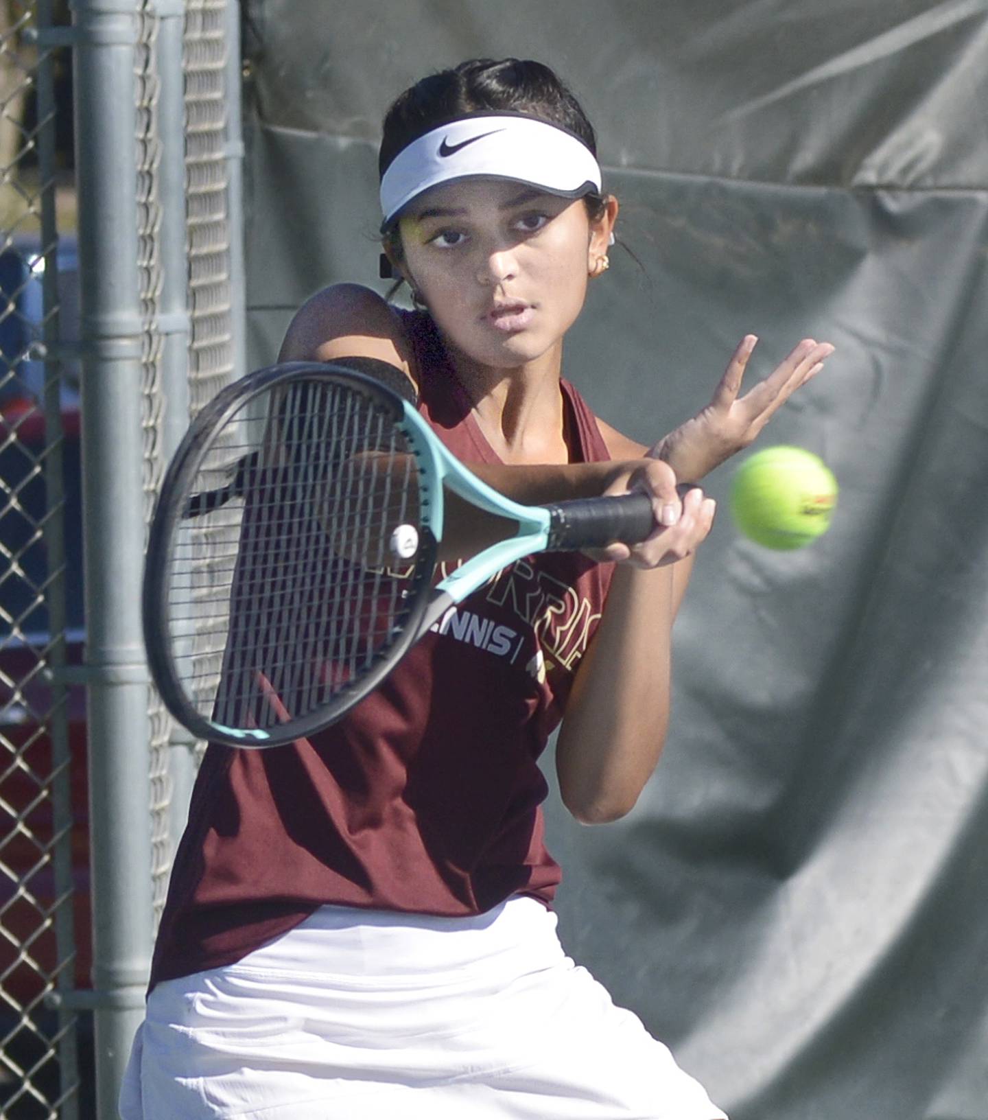 Morris’s Shreya Patel hits a shot during the singles finals of Saturday's Class 1A Ottawa Sectional at the Henderson-Guenther Tennis Facility.