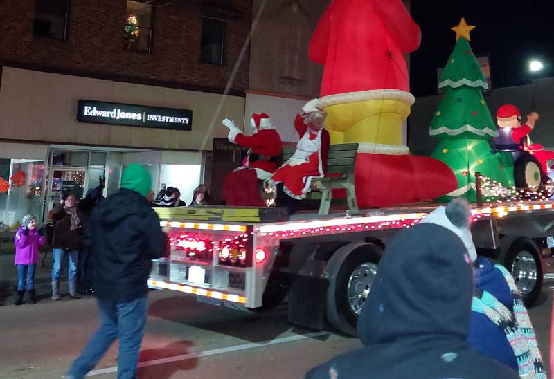 Santa and Mrs. Claus wave to parade goers Saturday, Nov. 25, 2023, during the Streator Lighted Christmas Parade.