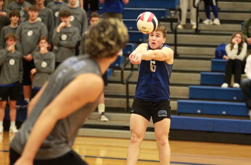 Geneva’s Rocco Lampiasi bumps the ball during a game against Wheaton Warrenville South at Geneva on Tuesday, April 2, 2024.