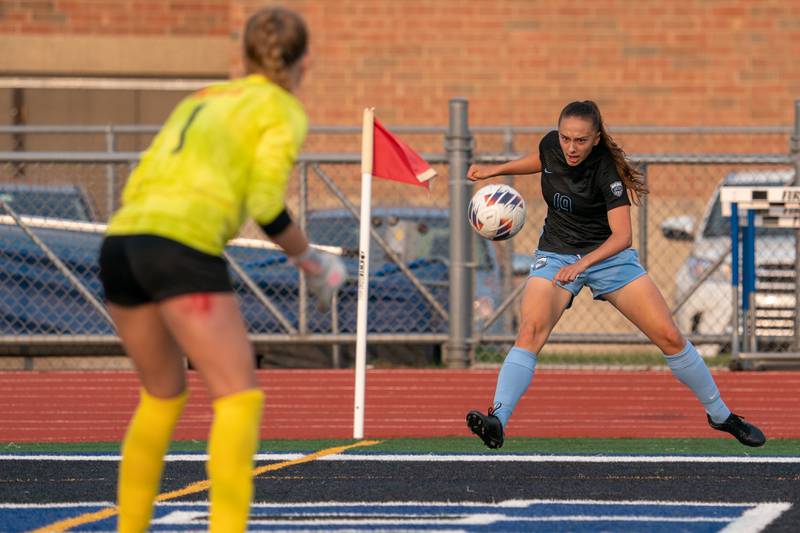 St. Charles North's Laney Stark (19) shoots the ball against Wheaton Warrenville South during the Class 3A girls soccer regional final at St. Charles North High School on Friday, May 19, 2023.