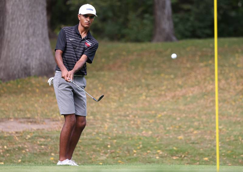 Huntley’s Taig Bhathal chips onto the green on hole two Monday, Sept. 16, 2024, during the Mark Rolfing Cup at the Kishwaukee Country Club in DeKalb.