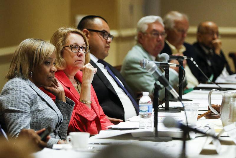 Board members listen to speakers during a Health Facilities and Service Review Board hearing for the Mercy hospital that plans to build in Crystal Lake Tuesday, June 20, 2017 in Bolingbrook. There were presentations of support and opposition while the board members determined how to decide on this $80 million facility.