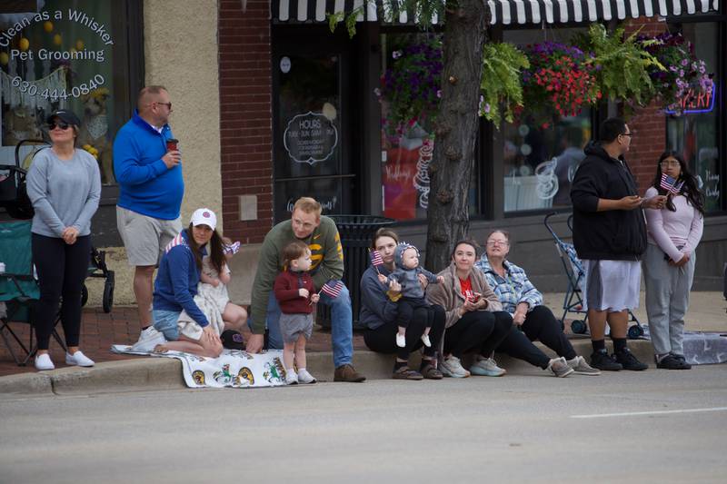 Familes line the street for the St. Charles Memorial Day Parade on Monday, May 27,2024 in St. Charles.