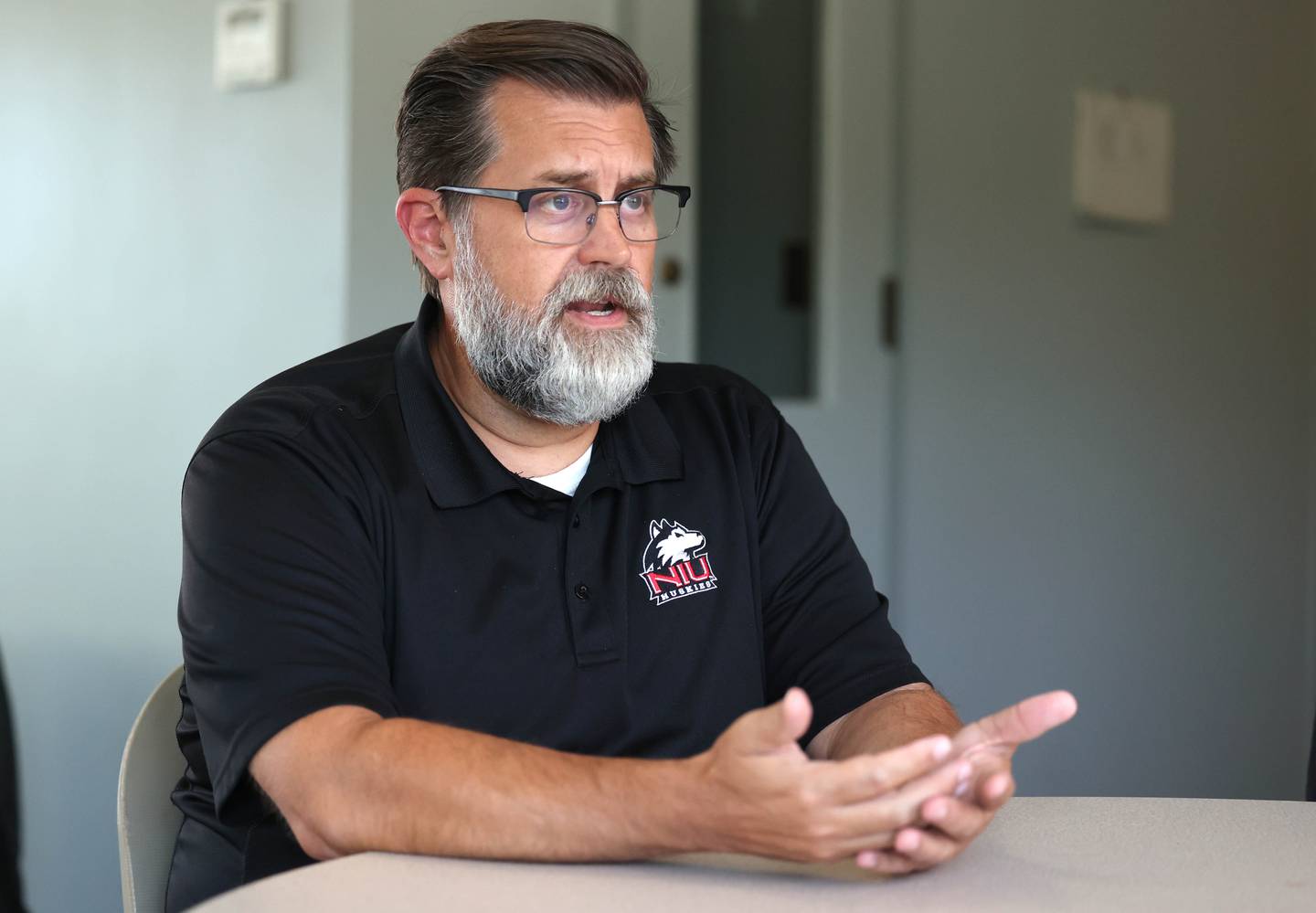 Northern Illinois University Assistant Director of Housing for Housing and Residential Services Tim Trottier talks Friday, Aug. 11, 2023, at Neptune Hall about items students can bring and things they can do to make the transition to living away from home easier.