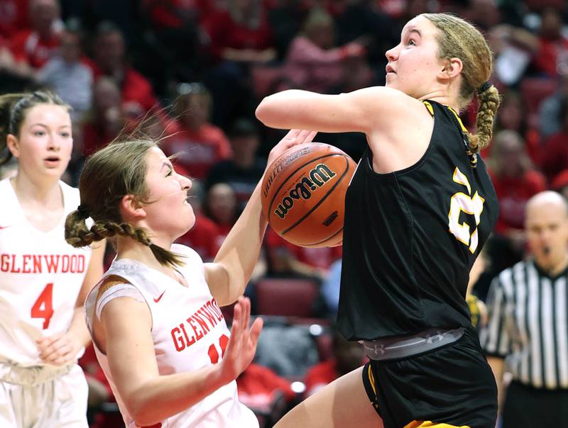 Hinsdale South's Maeve Savage has the ball knocked away as she goes to the basket by Glenwood's Makenna Yeager during their game Friday, March 1, 2024, in the IHSA Class 3A state semifinal at the CEFCU Arena at Illinois State University in Normal.