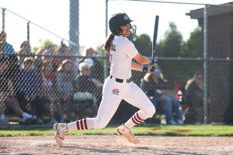 Lincoln-Way Central’s Isbella Olmos connects for a single against Lincoln-Way East in the Class 4A Lincoln-Way Central Sectional semifinal on Wednesday, May 29, 2024 in New Lenox.