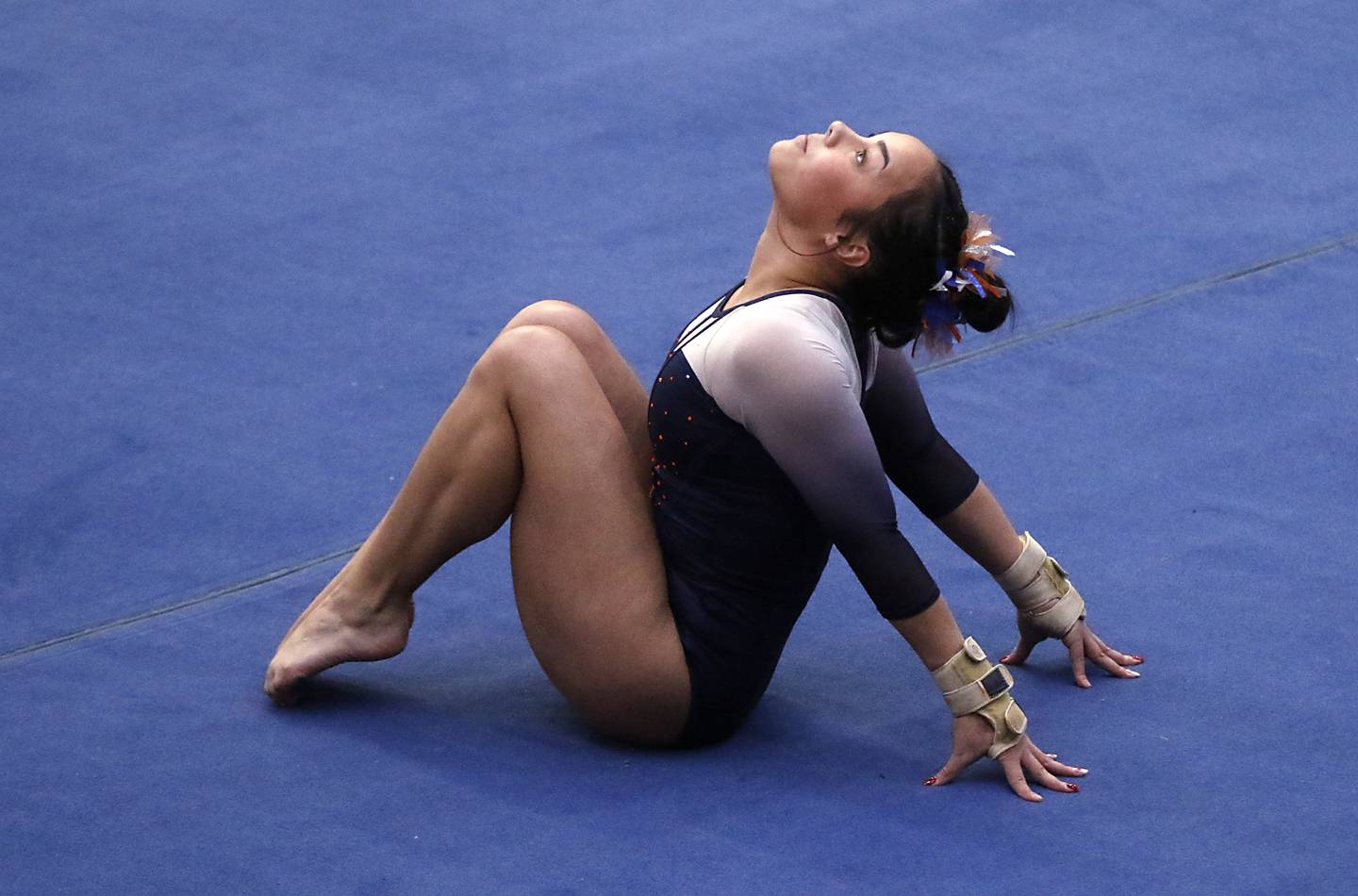 Oswego's Ava Sullivan competes on the floor exercise during the IHSA Girls State Gymnastics Meet at Palatine High School on Saturday, Feb. 17, 2024.