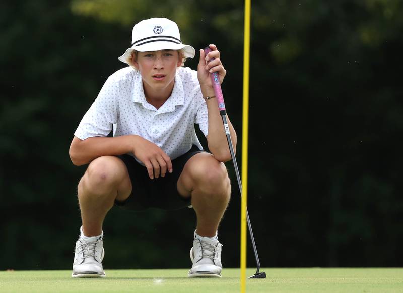 Burlington Central’s Tyler Samaan lines up a putt on the third green Monday, Sept. 16, 2024, during the Mark Rolfing Cup at the Kishwaukee Country Club in DeKalb.