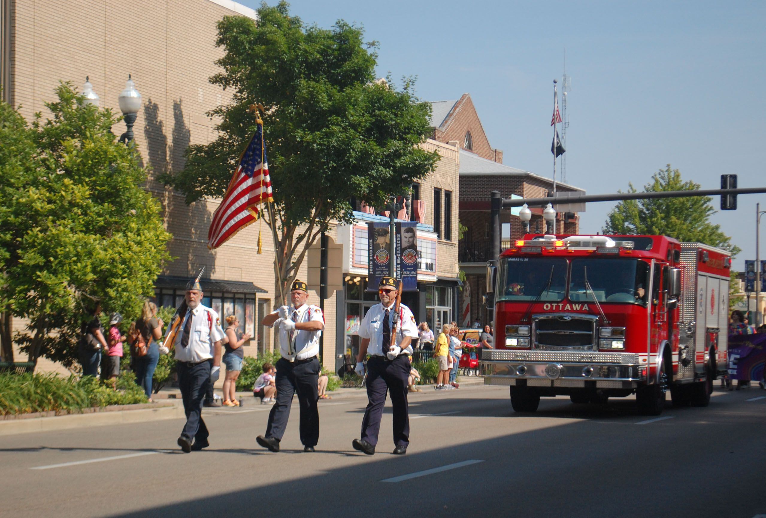 Members of the Ottawa American Legion lead the John Fisher Dann Memorial Pride Parade down La Salle Street in downtown Ottawa on Saturday, June 10, 2023.