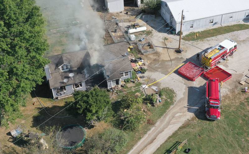 Smoke billows from a home in the 1300 block of 2500 East Street on Tuesday, Sept. 17, 2024 in rural Princeton Fire departments from eastern Bureau County were called to the scene just before 9:30a.m.