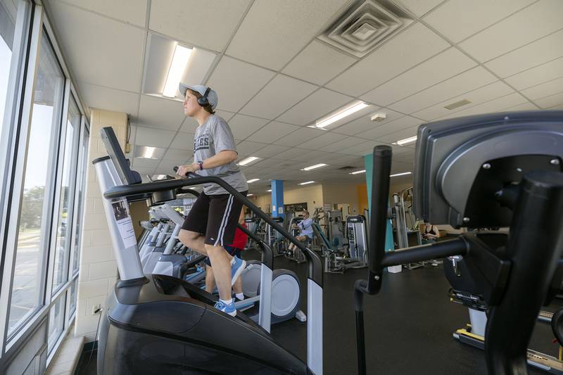 Kaile Valdez of Dixon works on the stair climbing machine Wednesday, Sept. 11, 2024, at the Dixon YMCA. The Y challenged patrons to climb 110 flights, the same as the World Trade Center, in remembrance of 9/11. Valdez had a goal of completion in about 25 minutes.