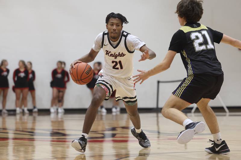 Lincoln-Way Central’s Korey Cagnolatti makes a move against Lemont on Wednesday, Jan. 10th, 2024 in New Lenox.