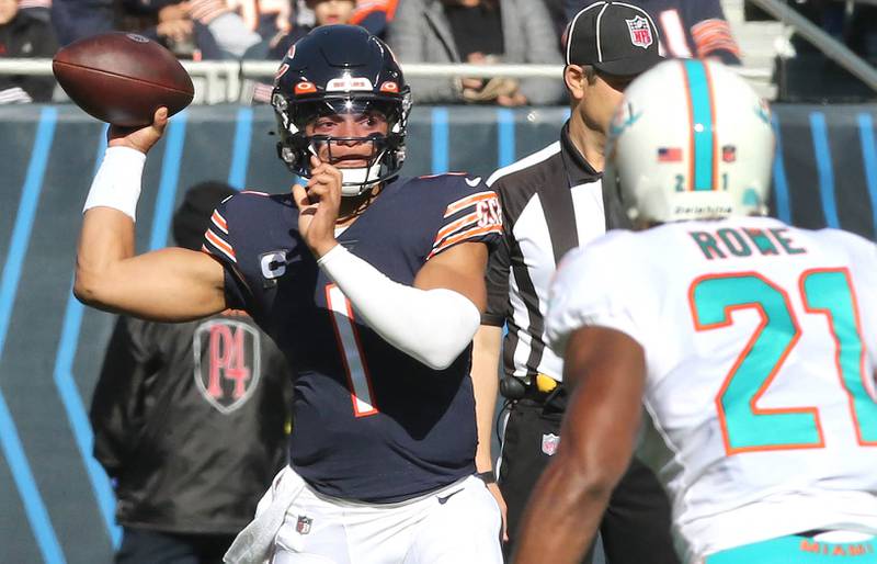 Chicago Bears quarterback Justin Fields looks for a receiver in the Miami Dolphins secondary during their game Sunday, Nov. 6, 2022, at Soldier Field in Chicago.