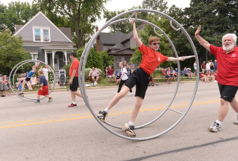 Member of the Dynamic Perception Dance Company Ian Stateek of Brookfield participates in the Downers Grove Fourth of July Parade on Thursday, July 4, 2024.