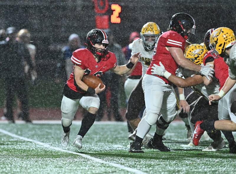 Lincoln-Way Central's Anthony Noto rushes the ball during the class 7A first round  playoff game on Friday, Oct. 27, 2023, at New Lenox. (Dean Reid for Shaw Local News Network)