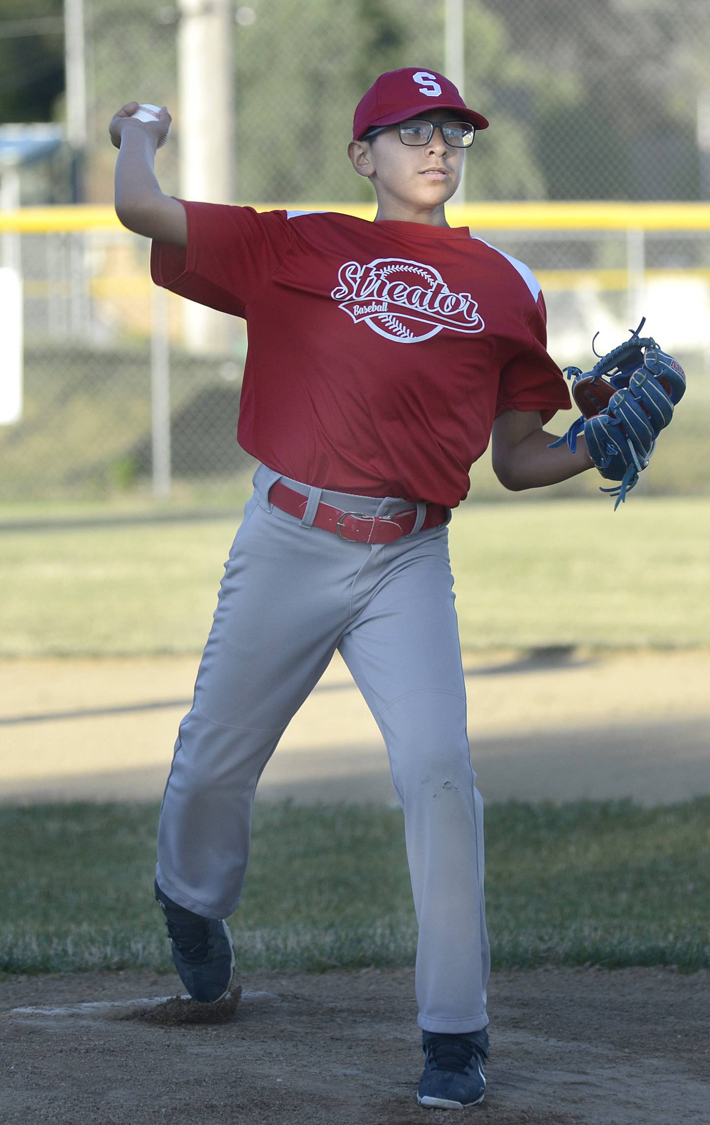 Streator Collision’s starting pitcher Ben Mascote lets go with a pitch against Hatzer & Son Wednesday during the championship game.