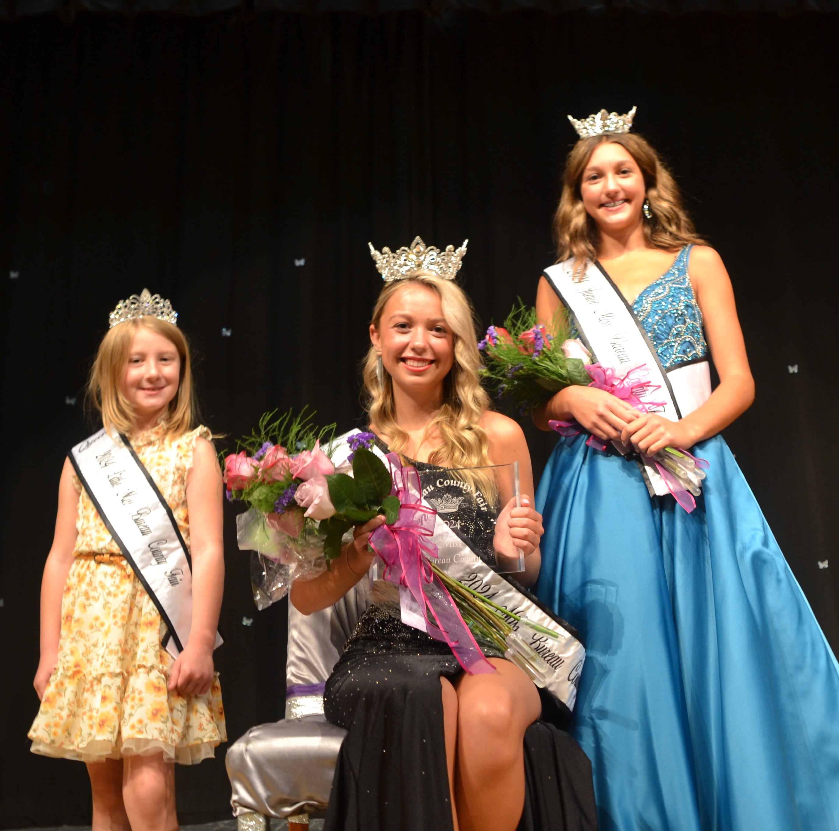 (Center) Hannah Hubinsky, 18 of La Salle was chosen as Miss Bureau County Fair. Her court includes Stella Denny (right) as the Junior Miss Bureau County Fair and Charlee Kruse as the Little Miss Bureau County Fair. The pageant was held Sunday, July 28, 2024, at Bureau Valley High School.