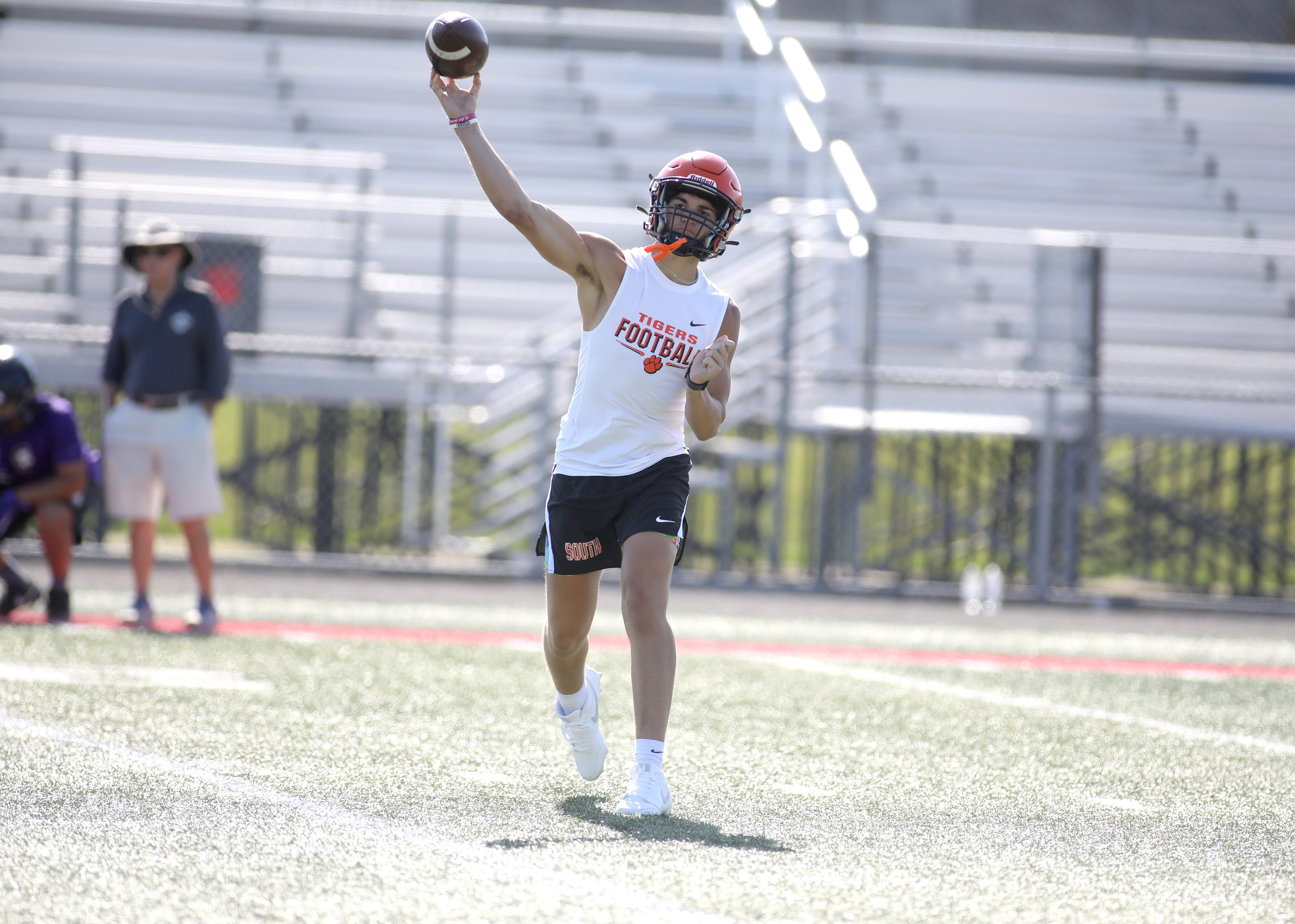 Wheaton Warrenville South quarterback Luca Carbonaro throws the ball during a 7-on-7 tournament at Batavia High School on Thursday, July 18, 2024.