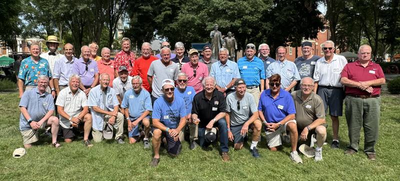 A group of Western Illinois University Lambda Chi Alpha fraternity brothers and their spouses had a reunion Saturday, July 27, at the Ottawa Drinkin’ with Lincoln Fest in Washington Square. The guys pose for a photo with Abe Lincoln.