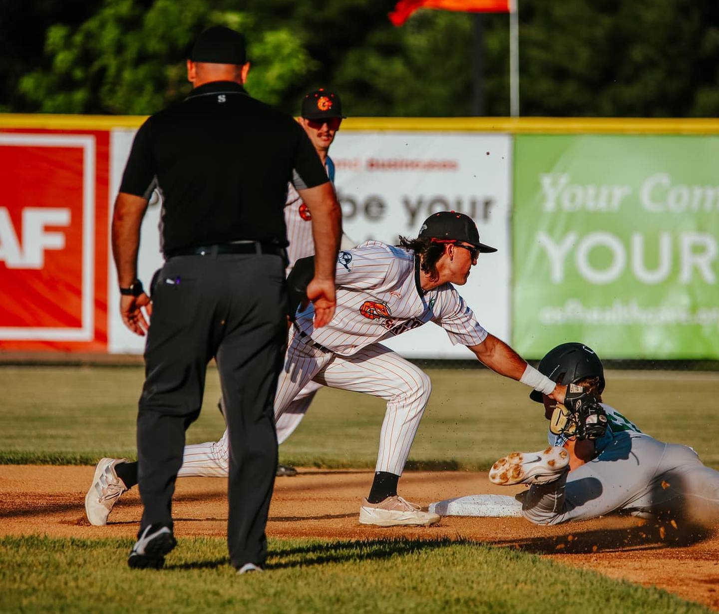 Luke Smock puts the tag on a Clinton runner during the Illinois Valley Pistol Shrimp's 4-3 victory over the Clinton LumberKings on Tuesday, June 18, 2024 at Schweickert Stadium in Peru.