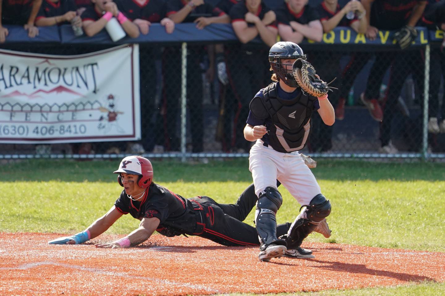 Yorkville's Jailen Veliz (12) beats the throw to the plate to score a run against Neuqua Valley during a Class 4A Neuqua Valley Regional semifinal baseball game at Neuqua Valley High School in Naperville on Thursday, May 23, 2024.