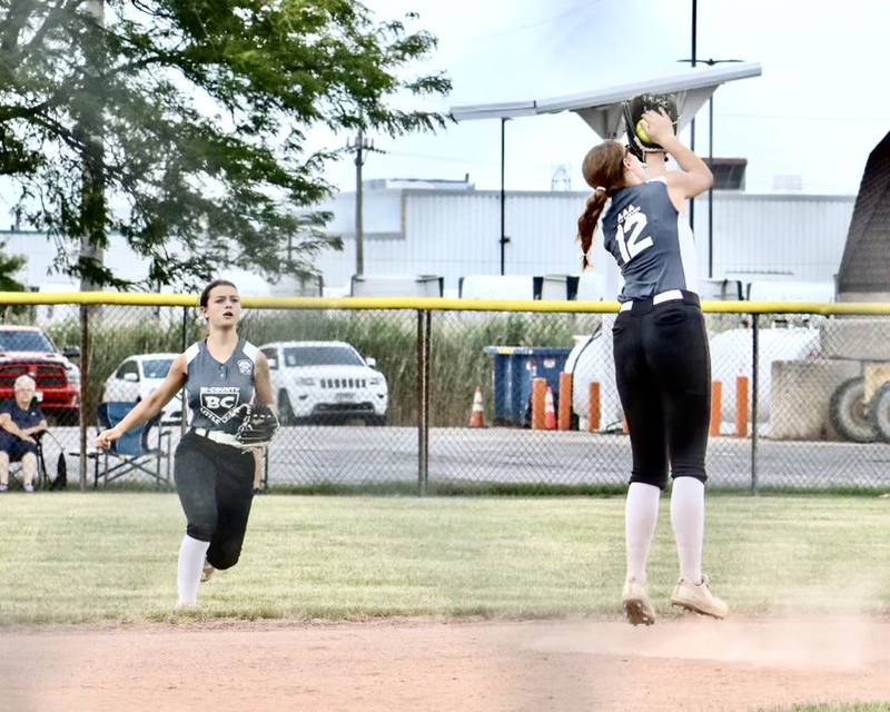 Bi-County's Chloe Parcher snags a pop fly during the Junior League Softball Tournament on Saturday in Burbank.