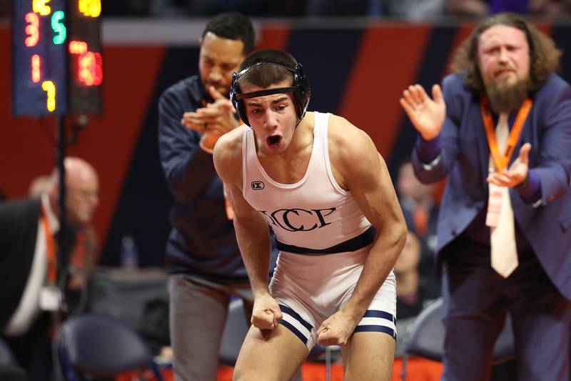 IC Catholic’s Deven Casey celebrates his win over Glenwood’s Drew Davis in the 120-pound Class 2A state championship match on Saturday, Feb. 17th, 2024 in Champaign.