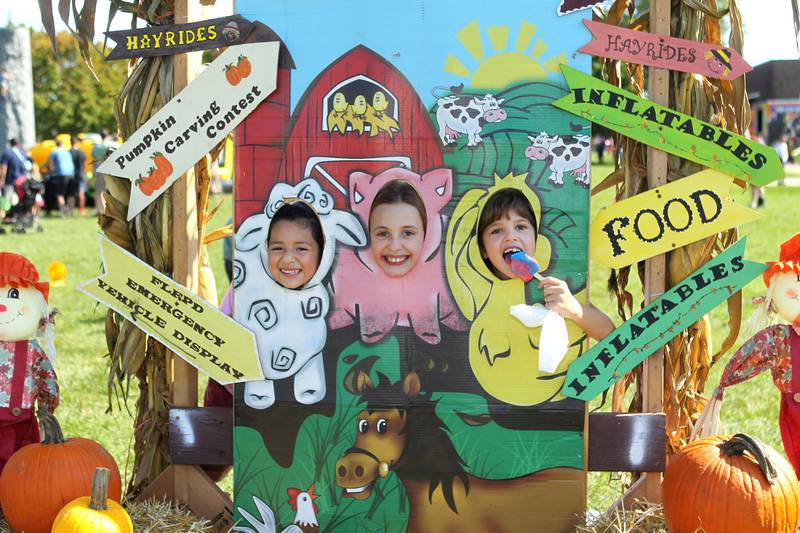 Mariana Arroyo, 7, of Round Lake, Gia Kucharski, 10, of Volo and her sister, Sophia, 7, enjoy the scenery during the Fall Festival at Grant Township Center on October 1st in Ingleside. The event was sponsored by the Village of Fox Lake and Grant Township.
Photo by Candace H. Johnson for Shaw Local News Network